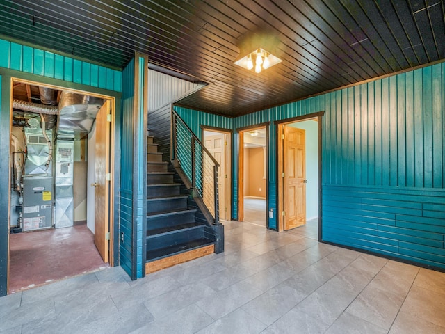 1731 Park Ave NW, Bemidji, MN 56601 - staircase with wooden walls and heating unit