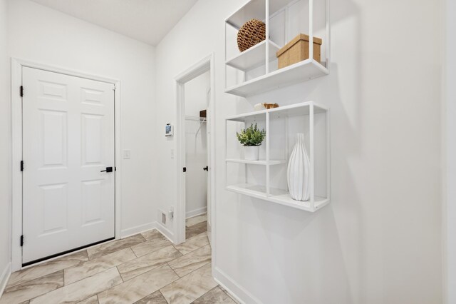 14551 74th St NE, Otsego, MN 55330 - mudroom with light marble finish floors and baseboards