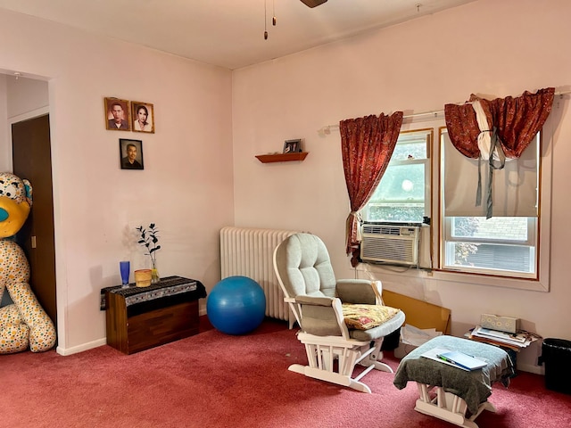 328 Edmund Ave, Saint Paul, MN 55103 - living area featuring radiator heating unit, carpet floors, ceiling fan, and cooling unit