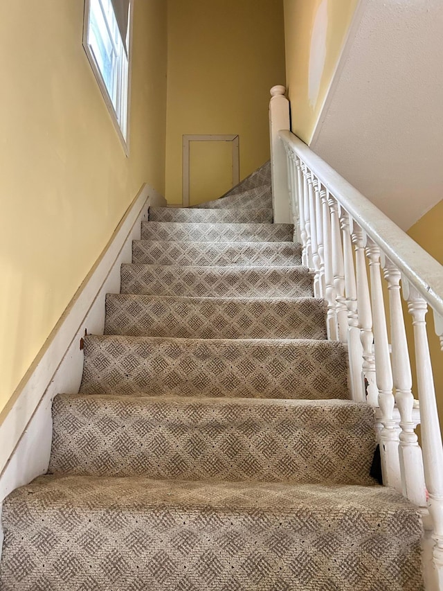 328 Edmund Ave, Saint Paul, MN 55103 - staircase with carpet flooring