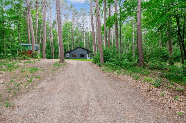 47235 184th Ave, Mcgregor, MN 55760 - view of front of property featuring dirt driveway and a wooded view