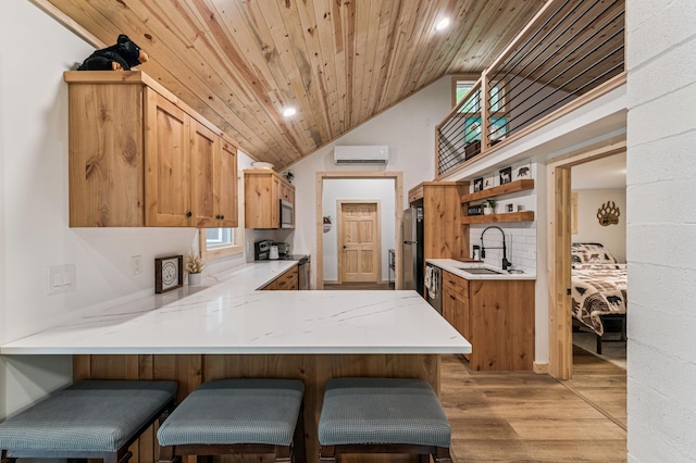 47235 184th Ave, Mcgregor, MN 55760 - kitchen with a wall unit AC, appliances with stainless steel finishes, wood ceiling, open shelves, and light countertops