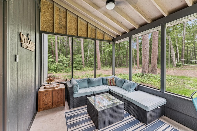47235 184th Ave, Mcgregor, MN 55760 - sunroom with lofted ceiling, healthy amount of natural light, a ceiling fan, and an outdoor hangout area