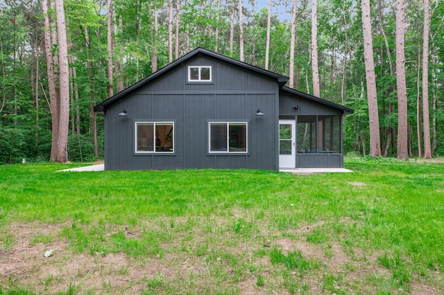 47235 184th Ave, Mcgregor, MN 55760 - rear view of property with a sunroom and a yard