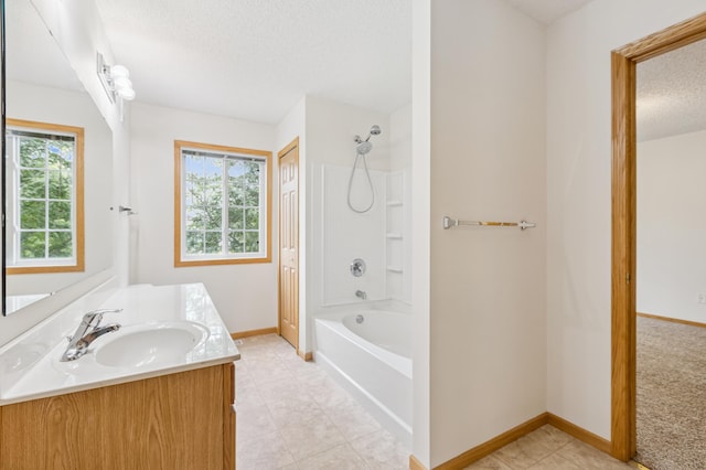 17128 Olson St NW Unit 2508, Elk River, MN 55330 - bathroom with vanity, shower / washtub combination, a textured ceiling, and tile patterned flooring