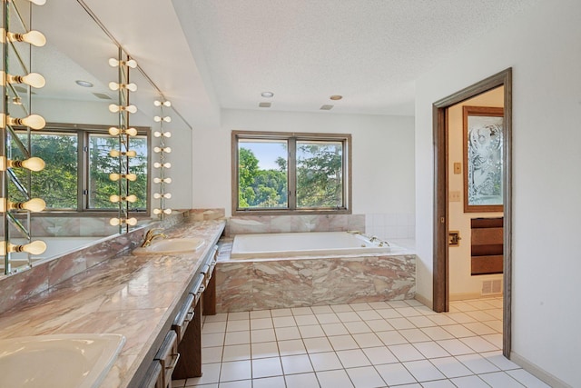 6541 Beach Rd, Eden Prairie, MN 55344 - full bath with double vanity, a garden tub, a textured ceiling, and tile patterned flooring