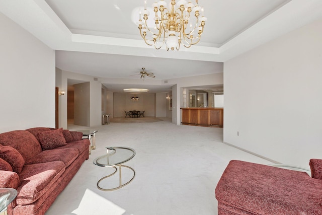 6541 Beach Rd, Eden Prairie, MN 55344 - carpeted living room featuring a raised ceiling and a chandelier