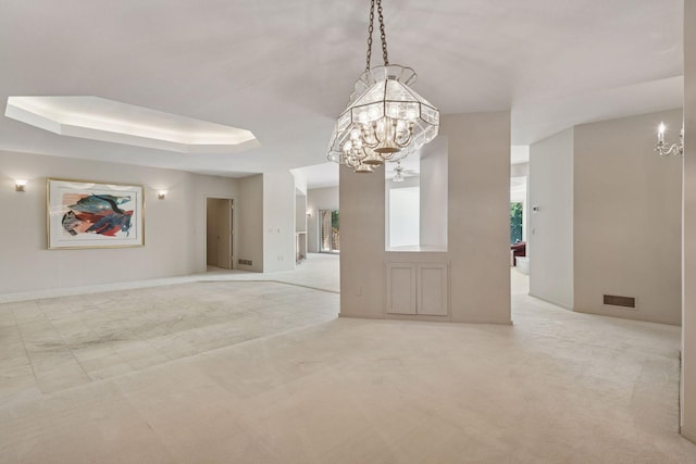 6541 Beach Rd, Eden Prairie, MN 55344 - carpeted spare room featuring a chandelier and a tray ceiling
