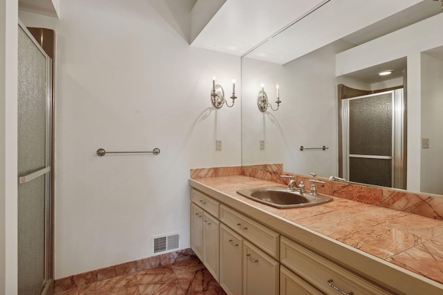 6541 Beach Rd, Eden Prairie, MN 55344 - bathroom with a stall shower, vanity, and marble finish flooring