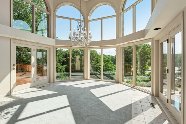 6541 Beach Rd, Eden Prairie, MN 55344 - unfurnished sunroom with french doors and a chandelier