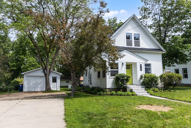 810 7th St NW, Faribault, MN 55021 - view of front of home with an outdoor structure, a front yard, and a garage