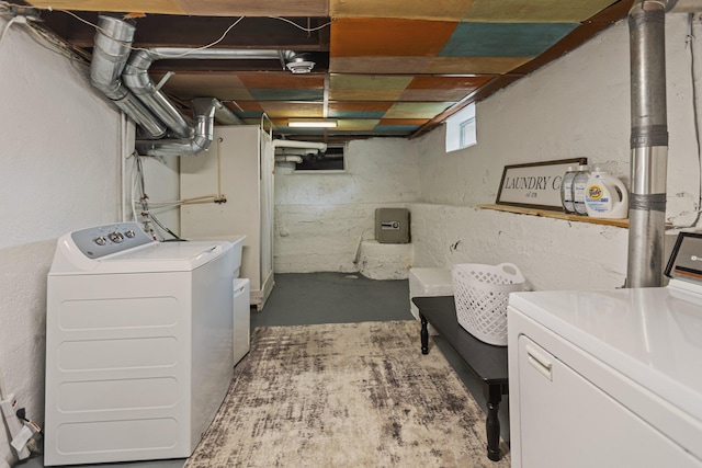 810 7th St NW, Faribault, MN 55021 - laundry room featuring washer and dryer and a textured wall