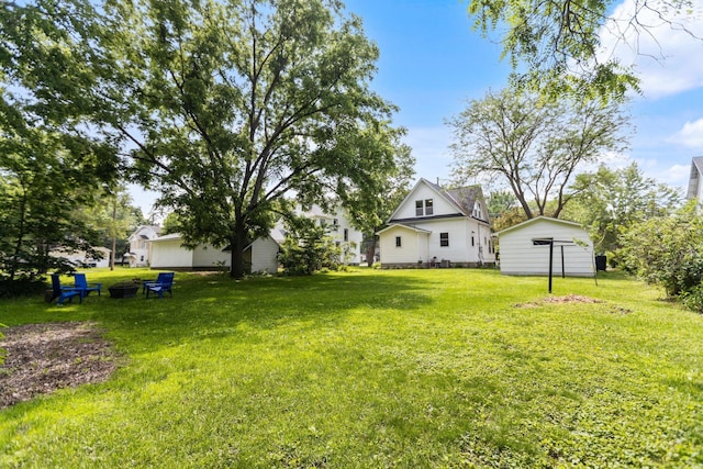 810 7th St NW, Faribault, MN 55021 - view of green lawn with a storage unit
