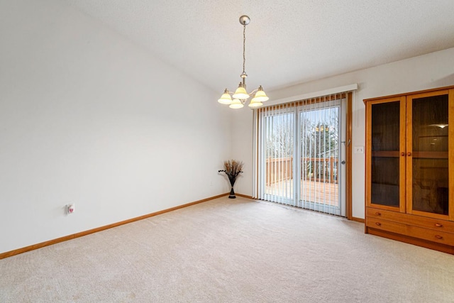 4929 Valley Dr NW, Rochester, MN 55901 - unfurnished room with a chandelier and carpet flooring