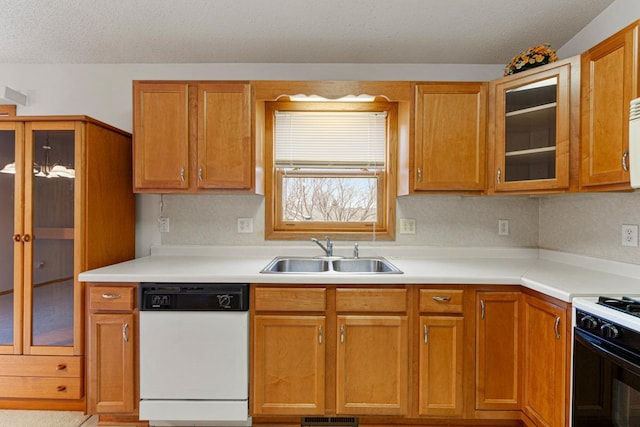 4929 Valley Dr NW, Rochester, MN 55901 - kitchen with white dishwasher, light countertops, gas range oven, glass insert cabinets, and a textured ceiling