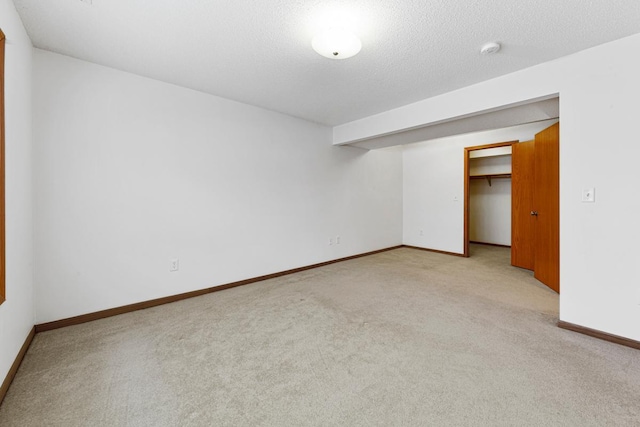 4929 Valley Dr NW, Rochester, MN 55901 - carpeted empty room with a smoke detector and a textured ceiling