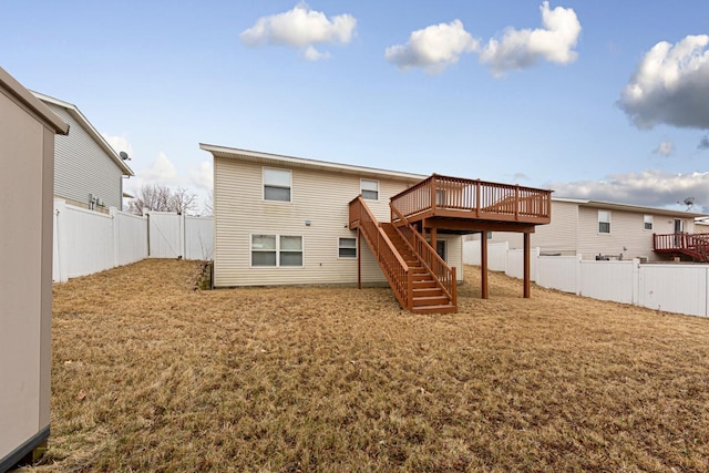 4929 Valley Dr NW, Rochester, MN 55901 - rear view of house featuring a deck, stairway, and a fenced backyard