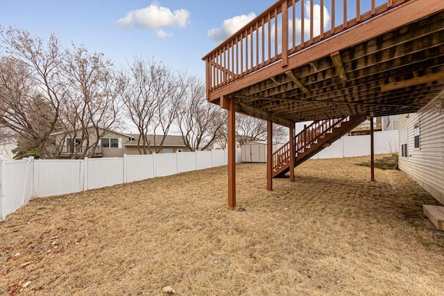 4929 Valley Dr NW, Rochester, MN 55901 - fenced backyard featuring a shed, stairway, and a wooden deck