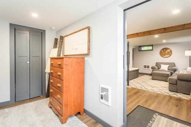 202 Park St, Alexandria, MN 56308 - hallway with recessed lighting, light wood-style flooring, and heating unit