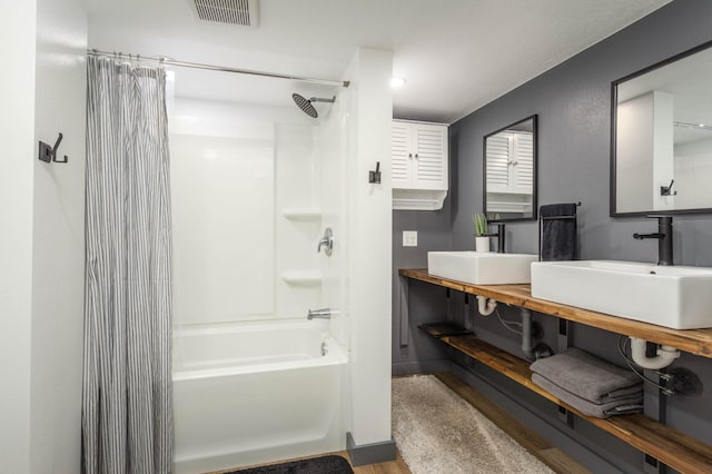 202 Park St, Alexandria, MN 56308 - bathroom with shower / bath combo and double vanity