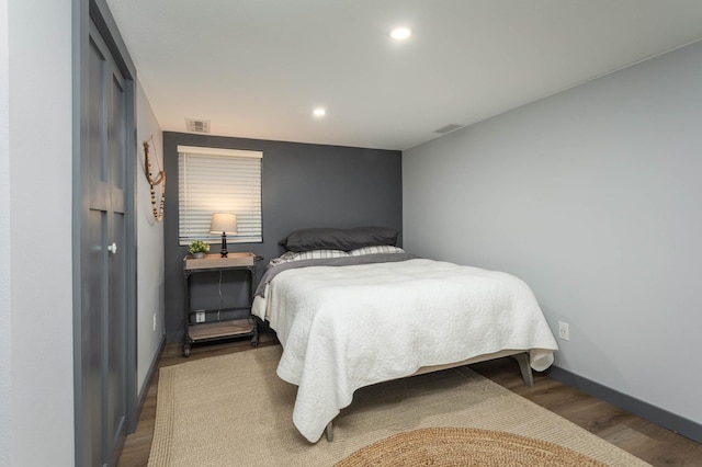 202 Park St, Alexandria, MN 56308 - bedroom featuring wood finished floors and recessed lighting