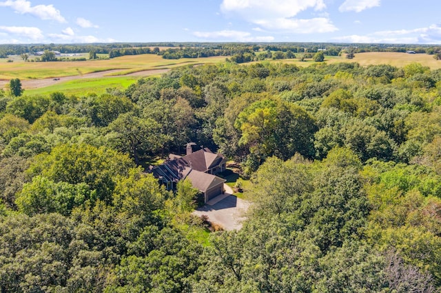 8011 County Road 13 SE, Delano, MN 55328 - aerial view of property and surrounding area featuring a heavily wooded area