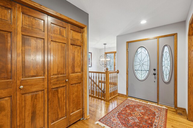 8011 County Road 13 SE, Delano, MN 55328 - entryway featuring light wood finished floors, a chandelier, and recessed lighting