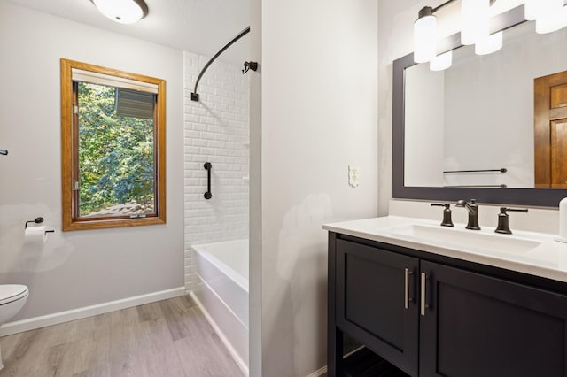 8011 County Road 13 SE, Delano, MN 55328 - full bath with vanity, wood finished floors, and shower / bath combination
