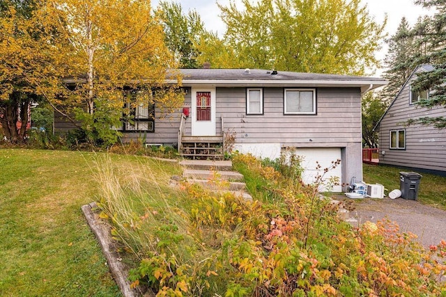 126 Niagara St, Duluth, MN 55811 - view of front of property featuring a garage, driveway, and a front lawn