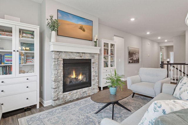 3841 Hyde Ave N, Oakdale, MN 55128 - living room with wood finished floors, a fireplace, and recessed lighting