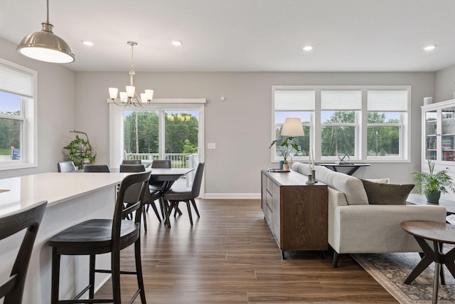 3841 Hyde Ave N, Oakdale, MN 55128 - living room with a chandelier, dark wood finished floors, and recessed lighting