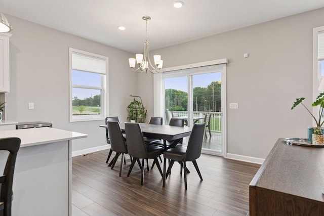 3841 Hyde Ave N, Oakdale, MN 55128 - dining area featuring a chandelier, dark wood-style flooring, and recessed lighting