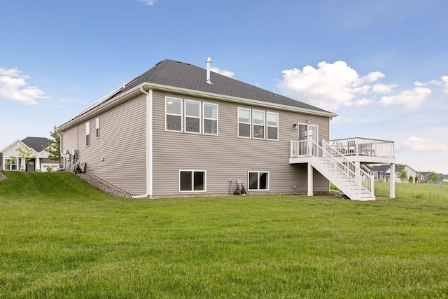 3841 Hyde Ave N, Oakdale, MN 55128 - rear view of house featuring a deck, a yard, and stairs