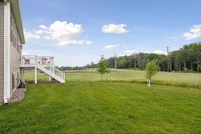 3841 Hyde Ave N, Oakdale, MN 55128 - view of green lawn with stairs and a wooden deck