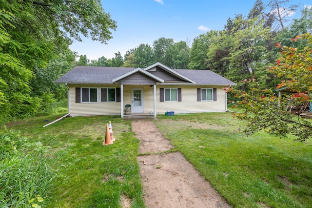 13143 County Road 116, Center Twp, MN 56465 - ranch-style home with a front lawn and a shingled roof