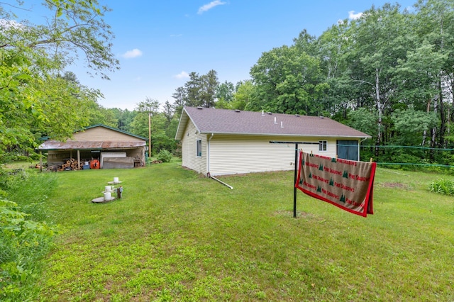 13143 County Road 116, Center Twp, MN 56465 - view of grassy yard featuring view of scattered trees