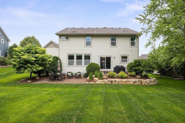 13332 Coachford Ave, Rosemount, MN 55068 - back of property with a lawn and a patio