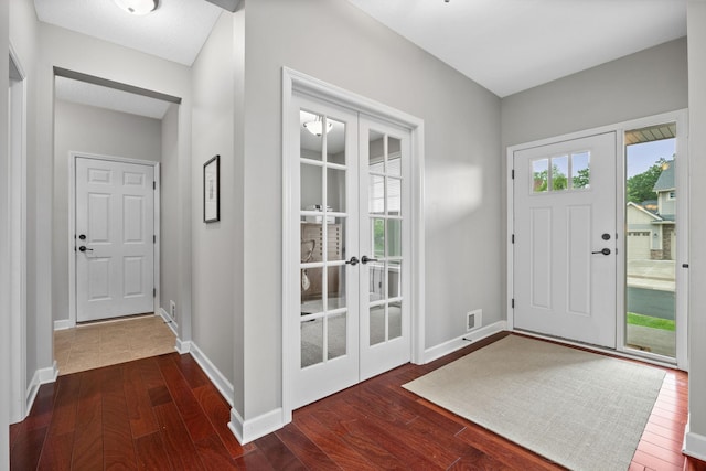 13332 Coachford Ave, Rosemount, MN 55068 - entrance foyer with french doors and dark wood-type flooring