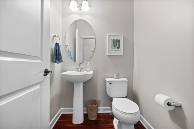13332 Coachford Ave, Rosemount, MN 55068 - bathroom featuring baseboards and wood finished floors