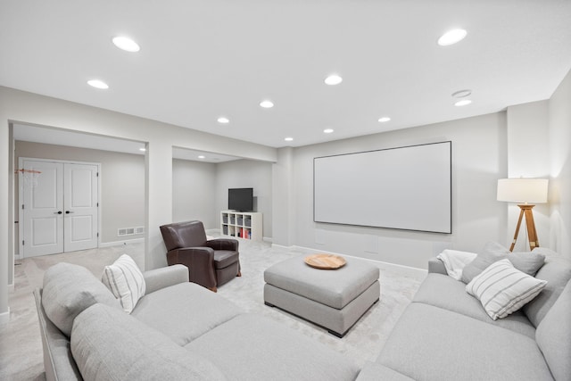 13332 Coachford Ave, Rosemount, MN 55068 - home theater room featuring light carpet and recessed lighting