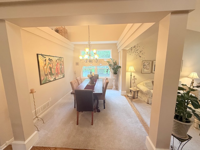 2228 Douglynn Ln, Saint Paul, MN 55119 - carpeted dining space with a chandelier and baseboards