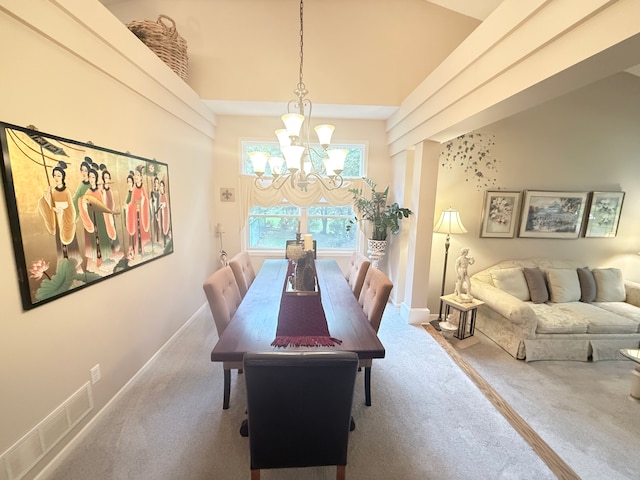 2228 Douglynn Ln, Saint Paul, MN 55119 - dining space with carpet floors and a chandelier