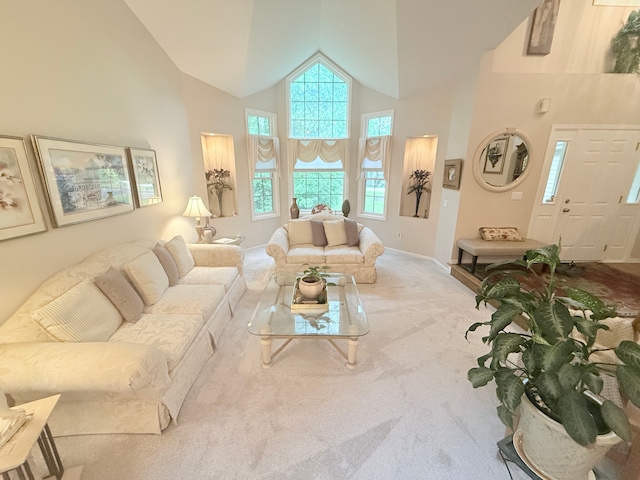 2228 Douglynn Ln, Saint Paul, MN 55119 - carpeted living room featuring high vaulted ceiling and baseboards