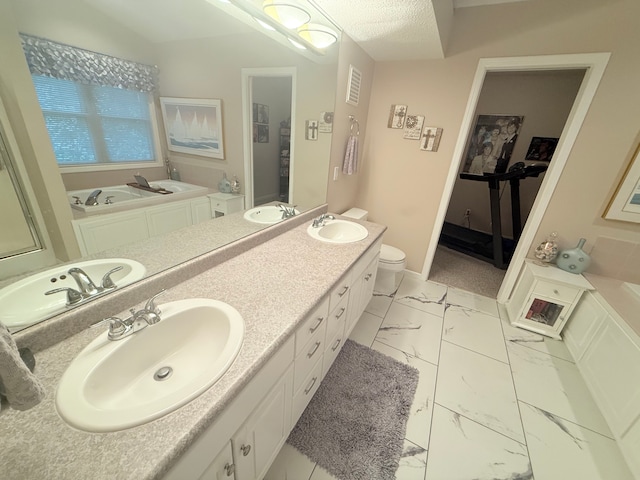 2228 Douglynn Ln, Saint Paul, MN 55119 - full bath with marble look tiles, a garden tub, and double vanity