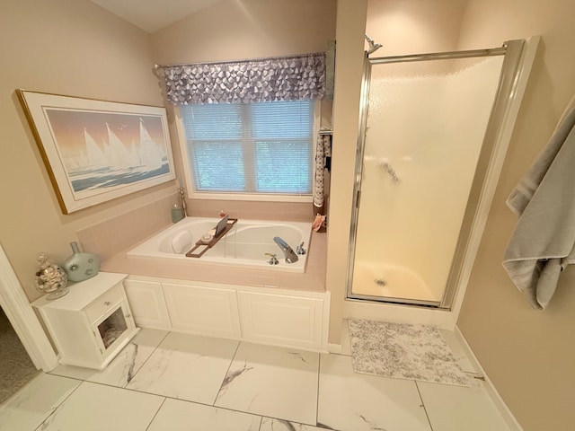 2228 Douglynn Ln, Saint Paul, MN 55119 - full bathroom with a shower stall, a bath, and marble look tiles