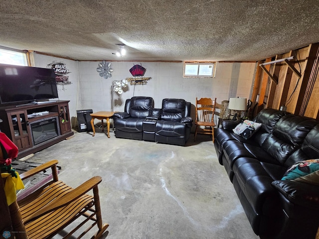147 5th St, Felton, MN 56536 - living area featuring concrete flooring and concrete block wall