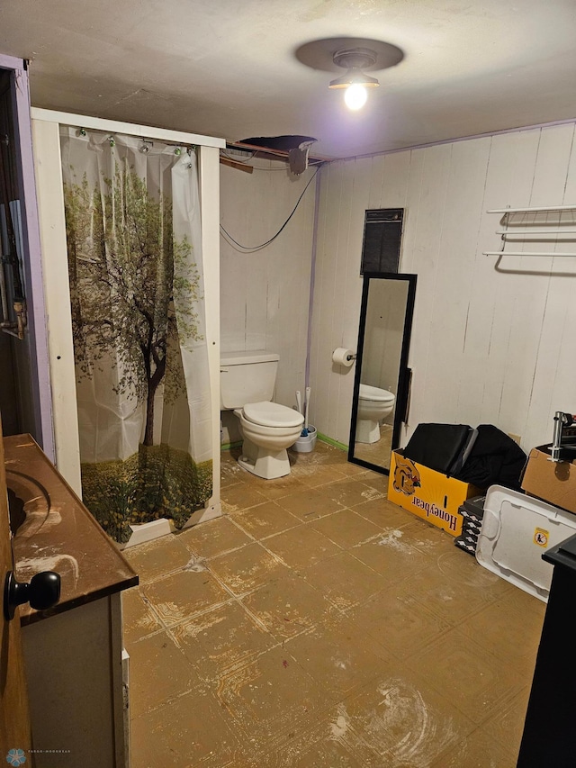 147 5th St, Felton, MN 56536 - bathroom featuring vanity, a shower with shower curtain, and tile patterned floors