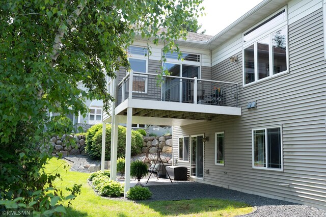 14578 Hunters Ln, Savage, MN 55378 - back of house with a patio