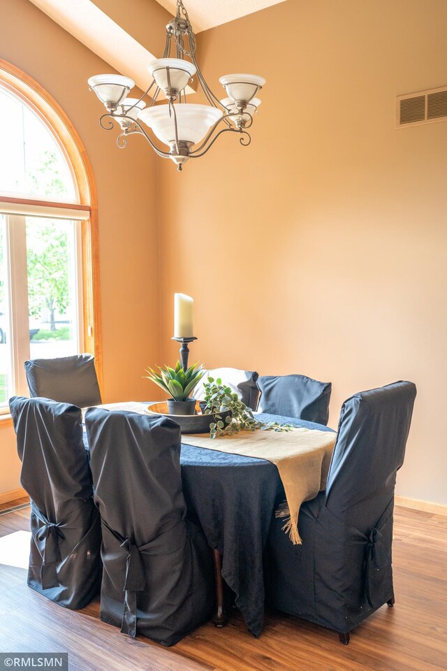 14578 Hunters Ln, Savage, MN 55378 - dining room with wood finished floors and a chandelier