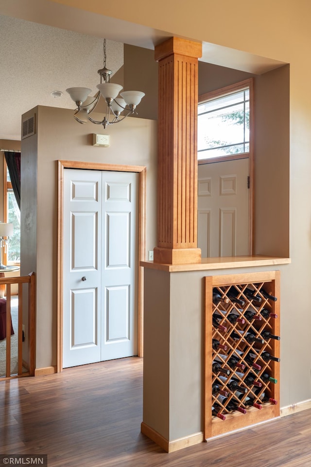 14578 Hunters Ln, Savage, MN 55378 - entryway featuring wood finished floors and a chandelier